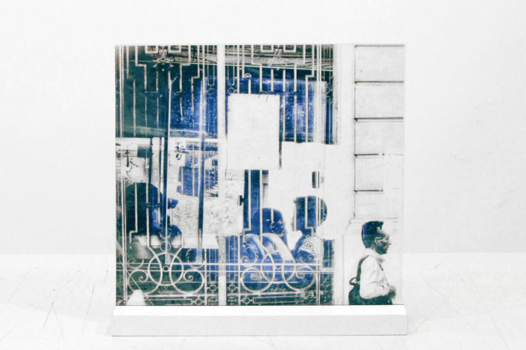 “Worldly fragmentations”, 2024, print on transparent vinyl adhesive on acrylic plate fixed to wood, 31 x 30,2 cm by Enzo Arcad, exhibited at Domio Gallery.