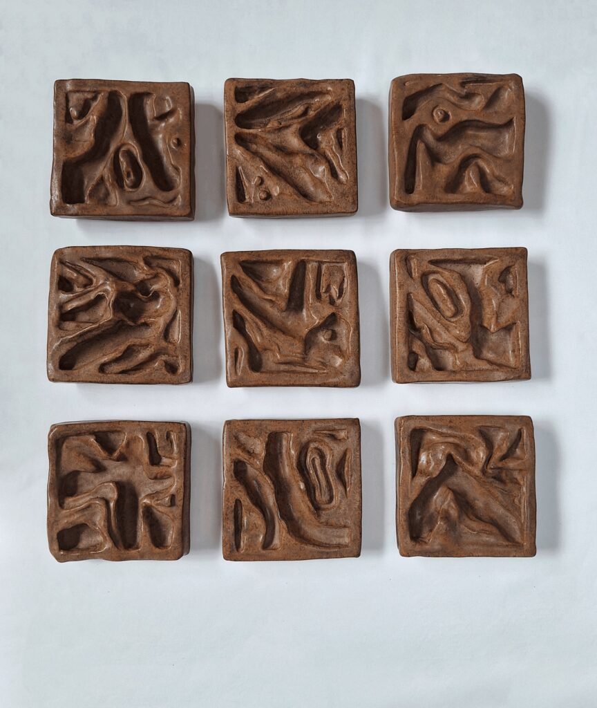 Undergrowth, 2026, Ceramic bas-relief sculpture, 43x43cm by Aneta Elder, exhibited at Domio Gallery.